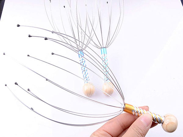 Ayurvedic relaxing hand-held head massager