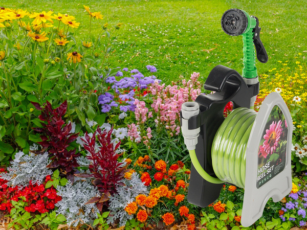 Garden waterring hose on a stand with a coiled spray gun 10m