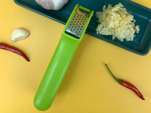 Garlic press hand squeezer crusher