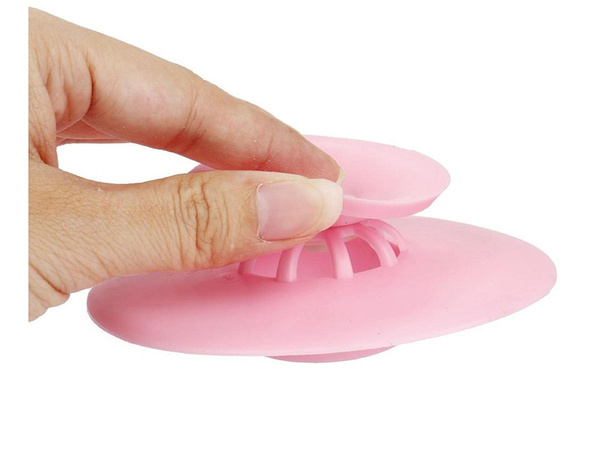 Silicone plug with a strainer for the sink 