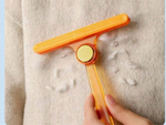 Brush roller for cleaning dog hair from rugs and carpets double sided