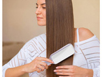 Self-cleaning hair brush for combing anti-static combing