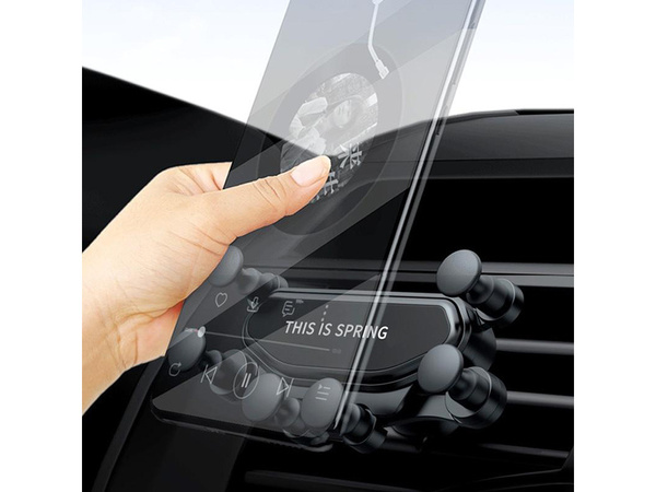 Gravitacijski nosilec za avtomobilske rešetke