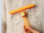 Brush roller for cleaning dog hair from rugs and carpets double sided