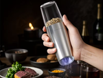 Electric gravity pepper and salt mill with lighting and adjustment