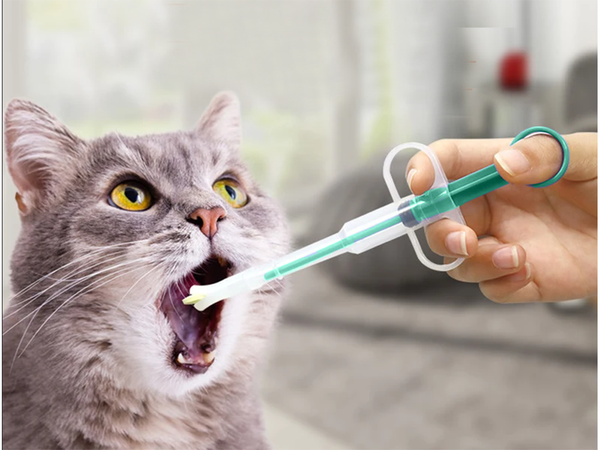 Aplikátor tabliet na lieky podávač injekčných striekačiek na mlieko