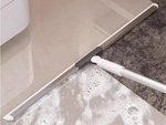 Water scraper for floors, windows and mirrors with a long telescopic handle