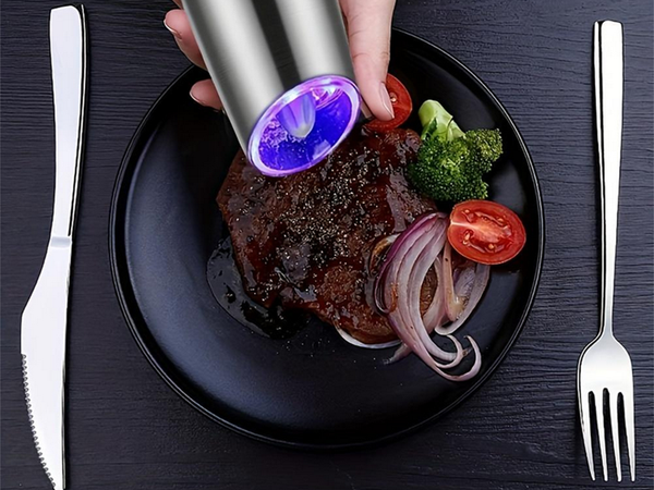 Electric gravity pepper and salt mill with lighting and adjustment