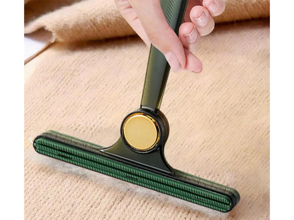 Brush roller for cleaning dog hair from rugs and carpets double sided