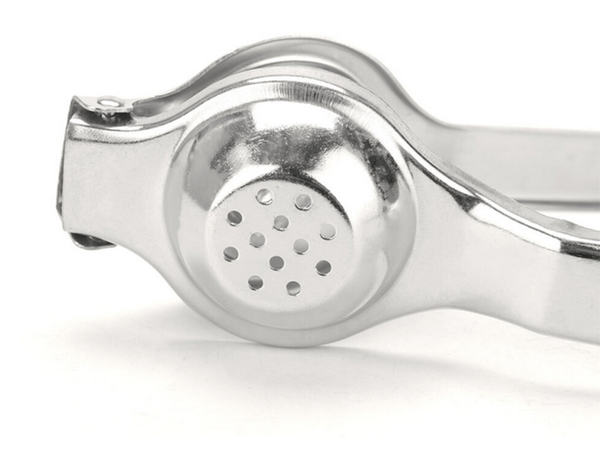 Exprimidor manual de limones cítricos