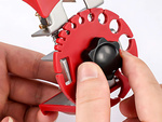 Hand-held cable stripper with adjustable cutting action