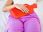 Thermo-chauffe dans une housse chauffe-abdomen en caoutchouc avec insert souple