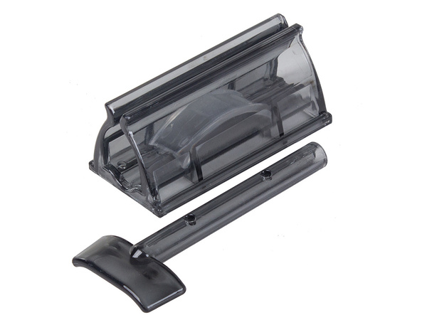 Stláčací dávkovač zubnej pasty v tube