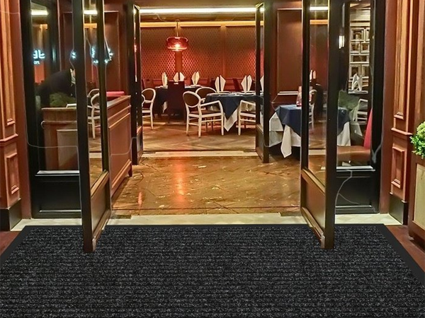 Rubberized doormat for shoes under the front door of the house 40 x 60
