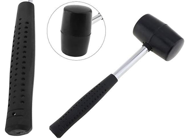 Recoilless rubber paving hammer