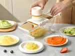 Hand-operated vegetable grater, multifunctional slicer with 6 blades
