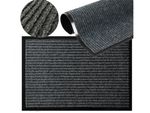 Rubberized doormat for shoes under the front door of the house 60 x 90