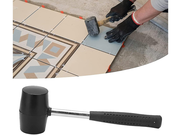 Recoilless rubber paving hammer