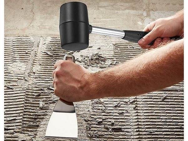 Recoilless rubber paving hammer