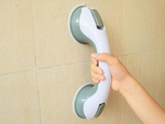 Bathroom suction cup holder handrail