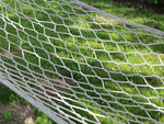 Hamac de jardin corde filet bois croisillons boho tressé blanc