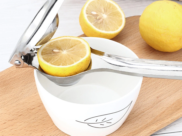 Exprimidor manual de limones cítricos