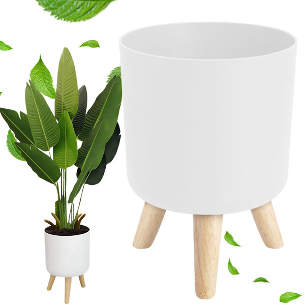 Flowerpot flower pot standing on legs for the house garden standing white