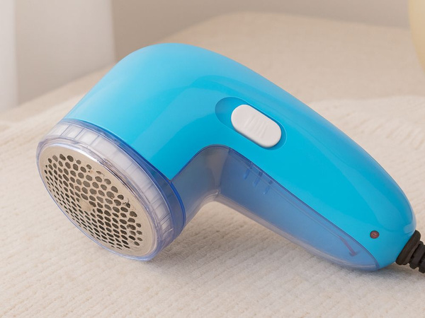 Electric clothes, sweater, upholstery and garment shaver with container, powerful