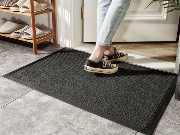 Rubberized doormat for shoes under the front door of the house 40 x 60