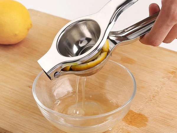 Citronu citrusaugļu manuālā sulu spiede