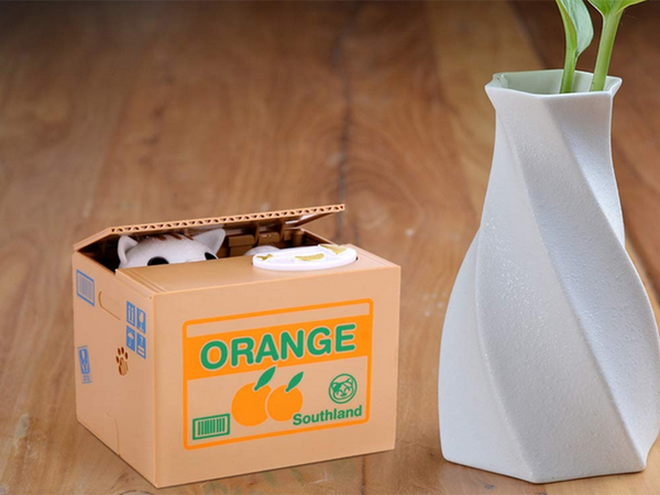 Tirelire chaton automate interactif miaule