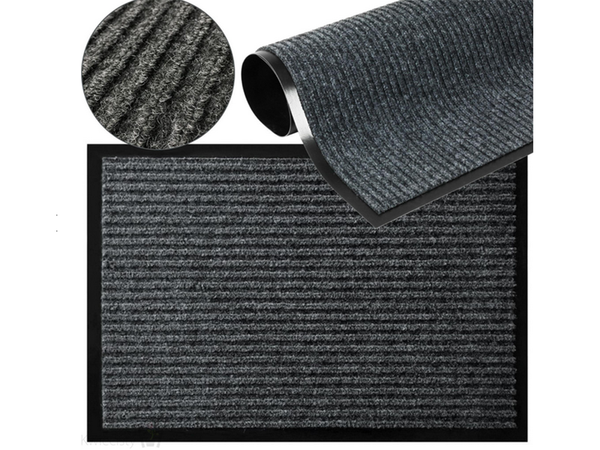 Rubberized doormat for shoes under the front door of the house 40 x 60
