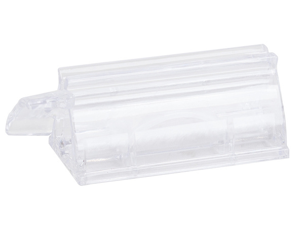 Dozirnik za zobno pasto v tubi s stiskalnikom