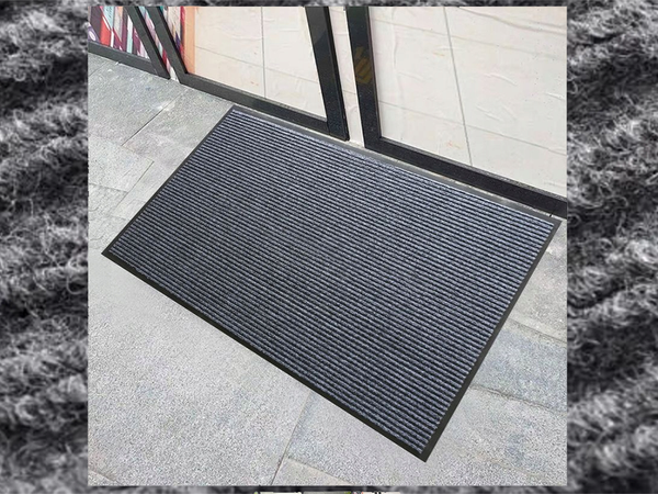 Felpudo de goma para zapatos bajo la puerta principal de la casa 60 x 90