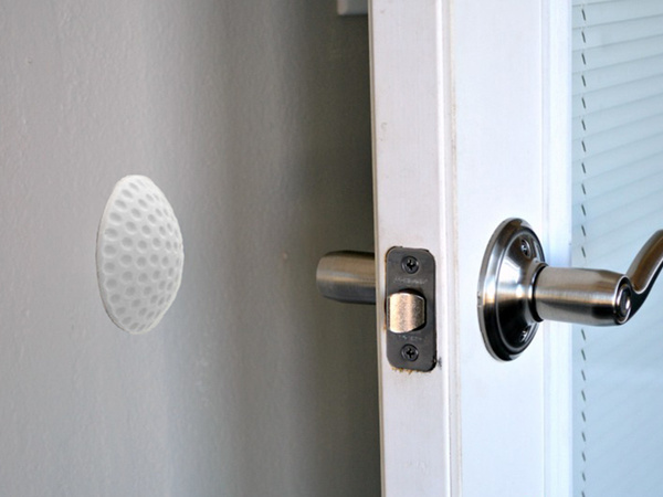 Door handle bumper self-adhesive to walls