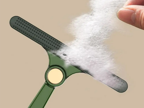 Brush roller for cleaning dog hair from rugs and carpets double sided