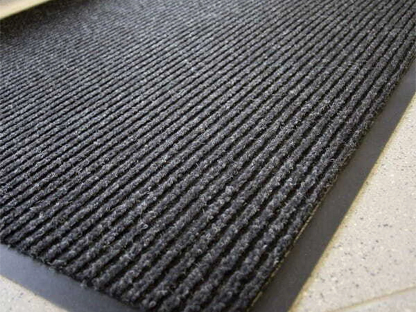 Rubberized doormat for shoes under the front door of the house 40 x 60