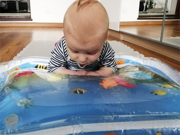 Inflatable sensory water mat for toddlers to play on
