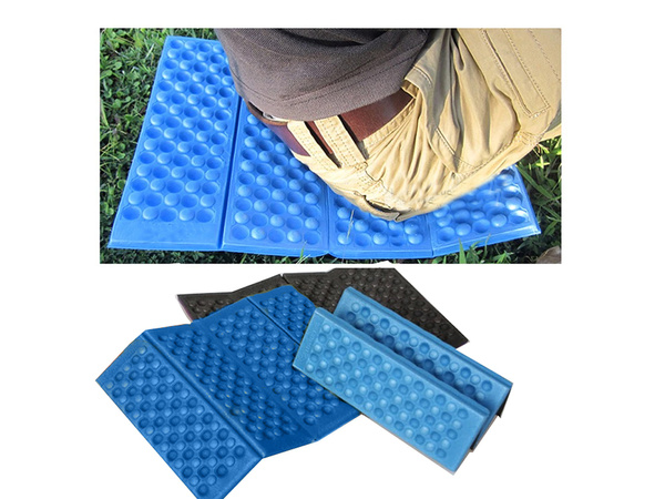 Foam folding hiking mat thermal seating carimata in the mountains