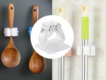 Self-adhesive brush holder for stick mop