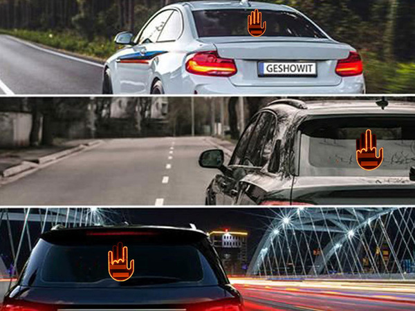 Gesture signalling hand on the rear window of a car middle finger led remote control