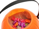 Seau d'halloween contenant des bonbons à la citrouille grand format