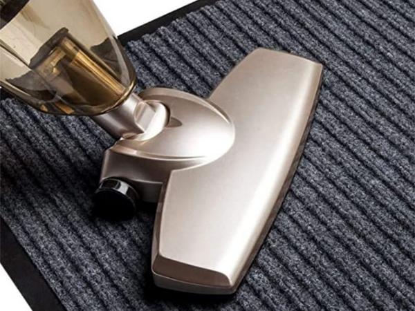 Rubberized doormat for shoes under the front door of the house 60 x 90