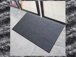 Rubberized doormat for shoes under the front door of the house 40 x 60