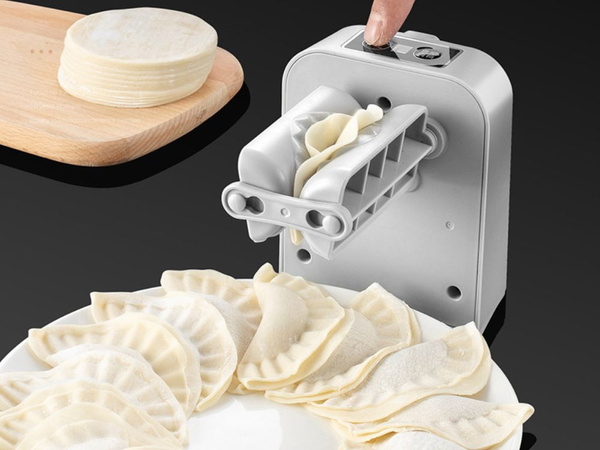 Elektrische Maschine zum automatischen und schnellen Herstellen von Teigtaschen